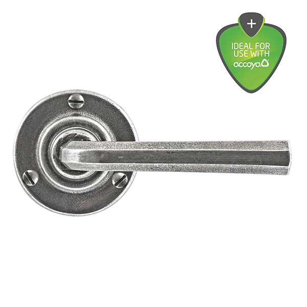 Tunstall pewter door handle on round rose